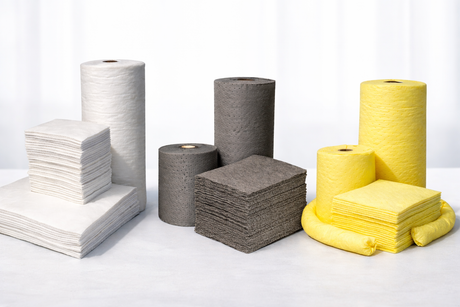 Absorbent pads, pillows, and socks - Oil-Only (white), Universal (gray), Hazmat (yellow) on clean studio background.