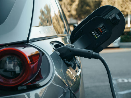 Electric car parked and charging 