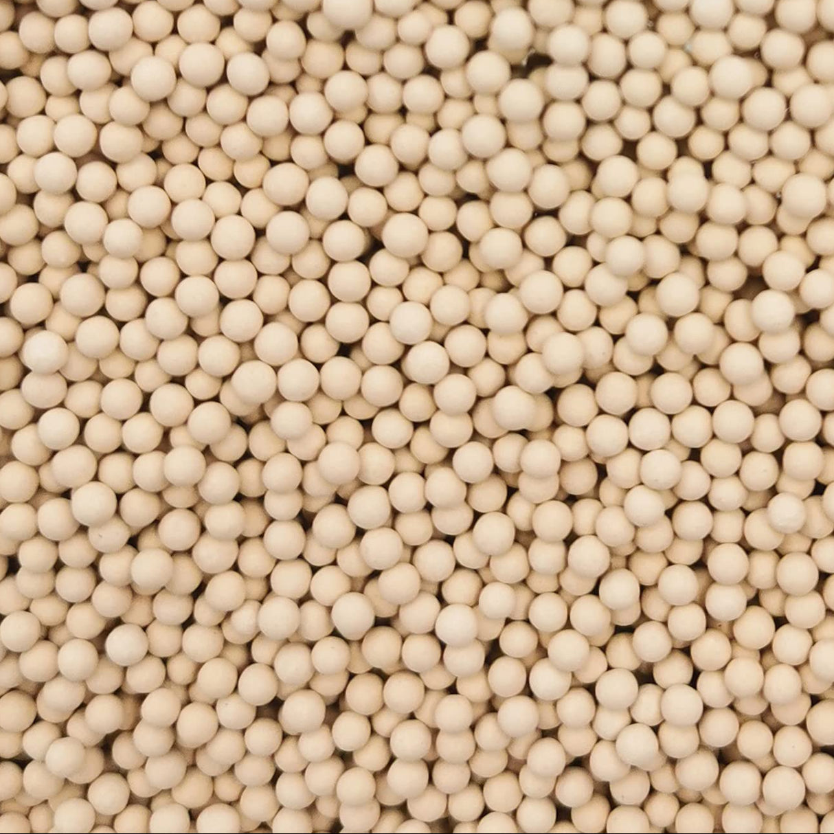 Close-up of 13X molecular sieve 4x8 mesh beads used for industrial gas drying and CO₂ removal
