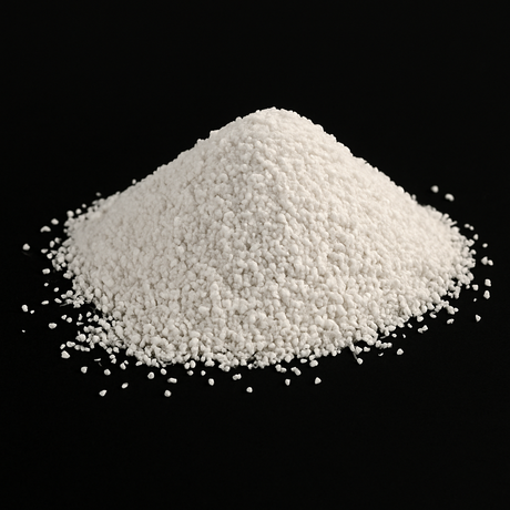 Pile of white granular activated alumina on a black background