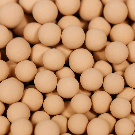 close up on pile of molecular sieve zeolite beads 