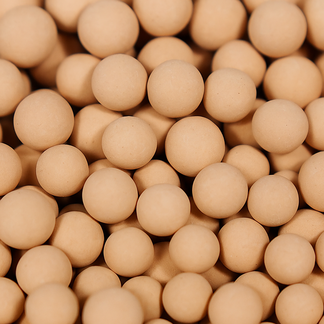 close up on pile of molecular sieve zeolite beads 