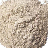 Close‑up of light brown bleaching earth clay used for edible oil purification