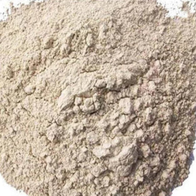 Close‑up of light brown bleaching earth clay used for edible oil purification