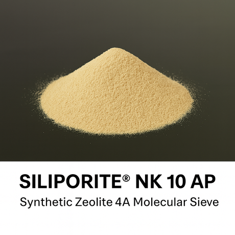 Pile of Siliporite NK 10 AP synthetic zeolite 4A molecular sieve on a black background